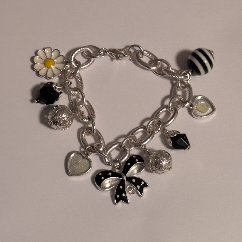 Black & Silver Bow Charm Bracelet with Daisy Accent